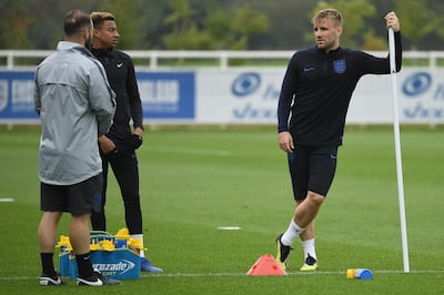 England's defender Luke Shaw (R) takes part in an open training session at St George's Park in Burton-on-Trent, central England on September 4, 2018, ahead of their international friendly football match against Spain on September 8. (Photo by Paul ELLIS / AFP) / NOT FOR MARKETING OR ADVERTISING USE / RESTRICTED TO EDITORIAL USE
