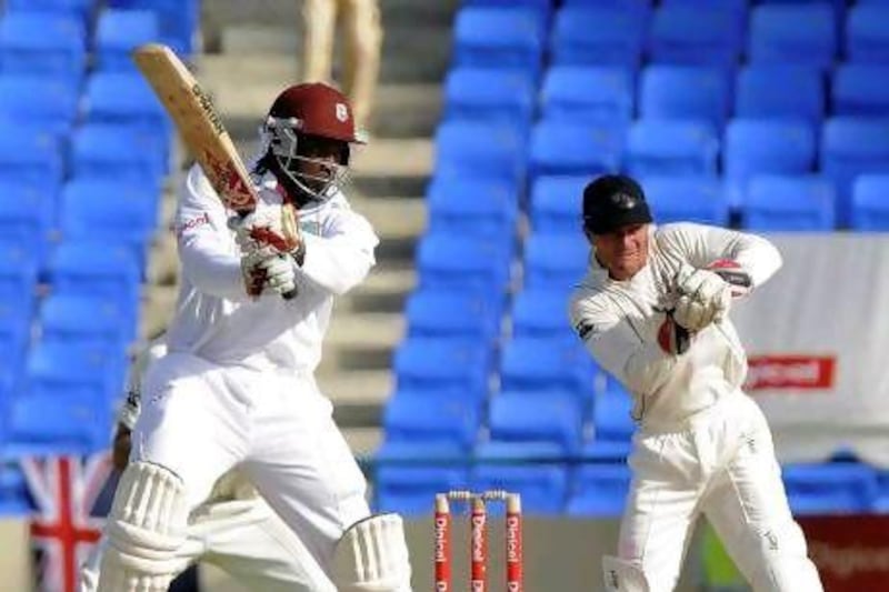 West Indies' Chris Gayle, left, returned to Test cricket in style.