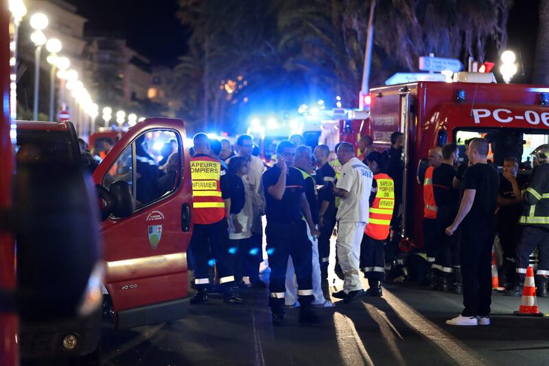 Rescue workers at the site of the attack on the Promenade des Anglais in Nice. AFP
