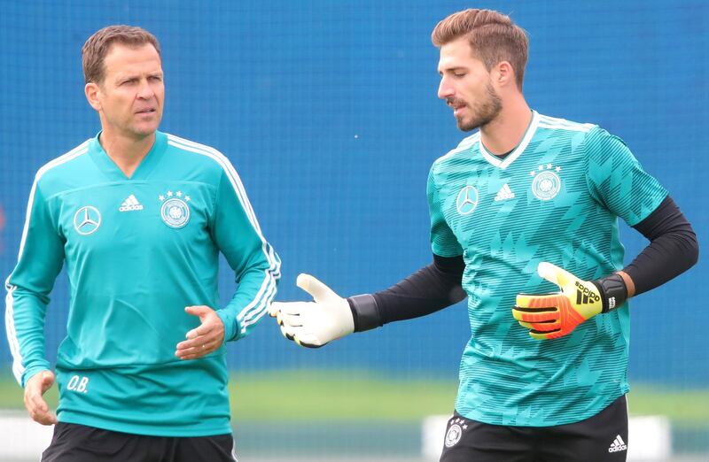 Oliver Bierhoff, team manager of Germany, speak to Kevin Trapp during a training session ahead of the 2018 FIFA World Cup at CSKA Sports Base in Moscow, Russia, on June 14, 2018. Alexander Hassenstein / Getty Images
