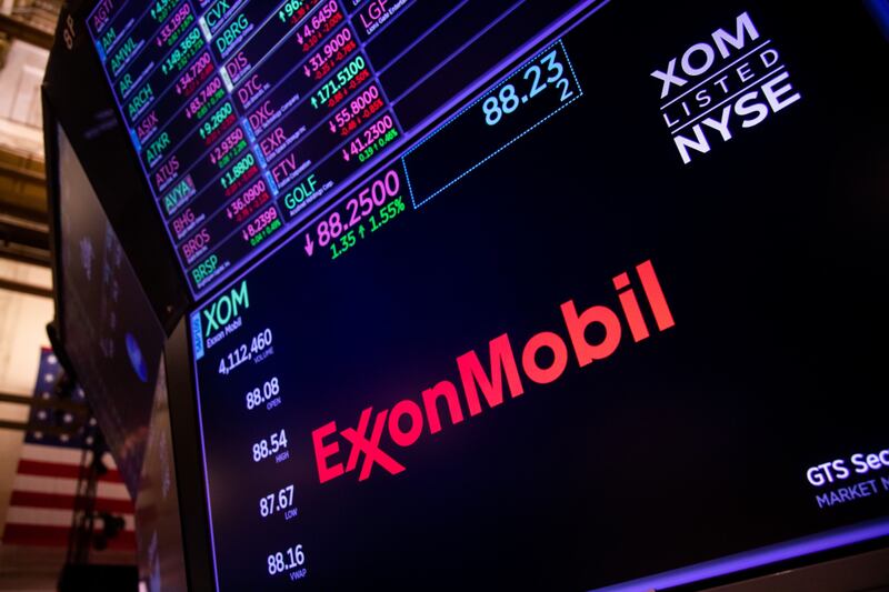 Exxon Mobil Corp signage on the floor of the New York Stock Exchange. Bloomberg