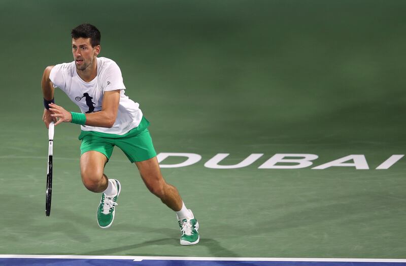 Novak Djokovic trains in Dubai on Sunday. EPA