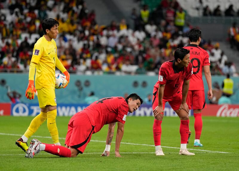 Dejected South Korea players after Mohammed Kudus scoring Ghana's third goal. AP
