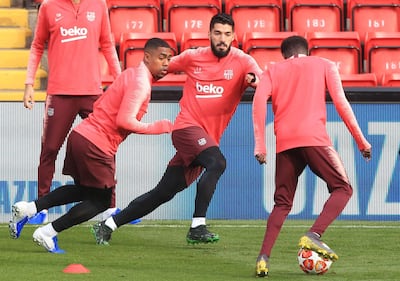 Barcelona's Uruguayan striker Luis Suarez (C) attends a training session at Anfield stadium in Liverpool, north west England on on May 6, 2019, on the eve of their UEFA Champions League semi-final second leg football match against Liverpool.  / AFP / Lindsey PARNABY
