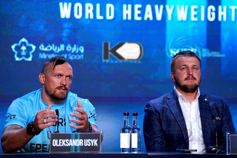 Oleksandr Usyk and K2 Promotions chairman Alexander Krassyuk. PA