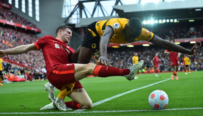 Willy Boly - 7 The 31-year-old stood strong against the Liverpool onslaught. He blocked an Alexander-Arnold shot and made a last-gasp tackle that stopped Salah from scoring. 
EPA