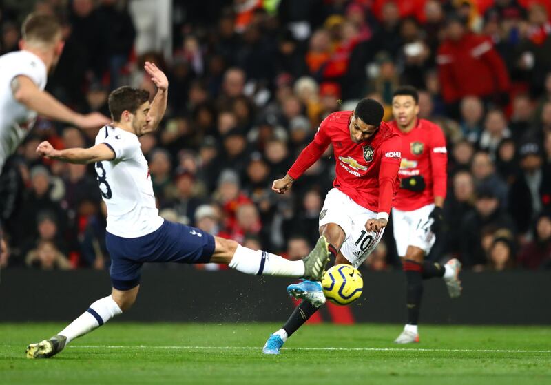 MANCHESTER, ENGLAND - DECEMBER 04: Marcus Rashford of Manchester United scores his team's first goal during the Premier League match between Manchester United and Tottenham Hotspur at Old Trafford on December 04, 2019 in Manchester, United Kingdom. (Photo by Michael Steele/Getty Images)