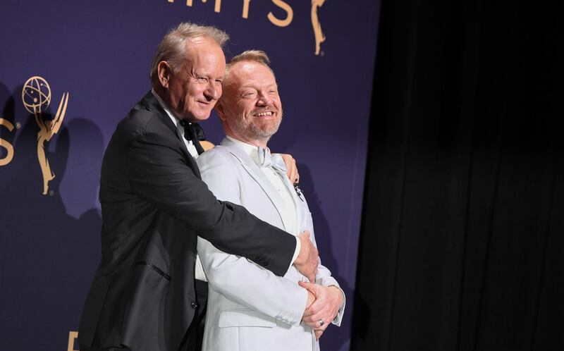 Stellan Skarsgård (L) and Jared Harris (R) pose after 'Chernobyl' won the Outstanding Limited Series award during the 71st Emmy Awards at the Microsoft Theatre in Los Angeles on September 22, 2019. AFP