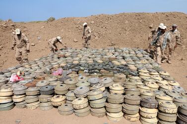 Explosives experts collect mines and explosives allegedly planted by the Houthi rebels, at the port city of Hodeidah in December 2018. EPA