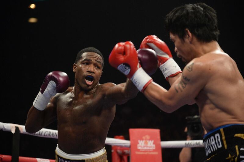 Manny Pacquiao and Adrien Broner box. Reuters