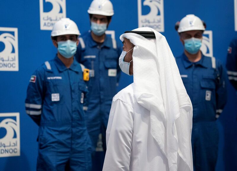 The Crown Prince of Abu Dhabi meets some of Adnoc's engineers during a visit to a plant in Ruwais. Courtesy: Sheikh Mohamed bin Zayed Twitter