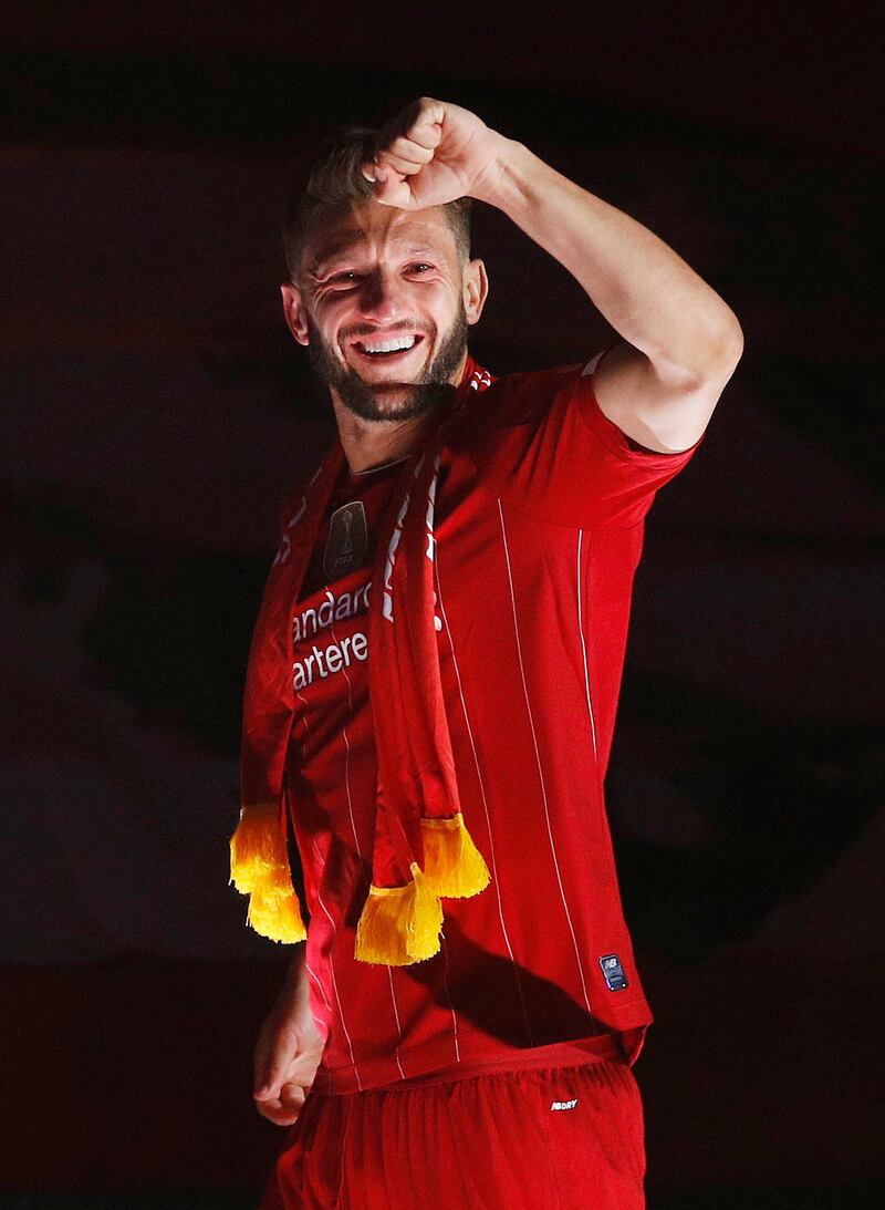 Adam Lallana celebrates at Anfield after Liverpool lifted the Premier League title following a 5-3 win over Chelsea. Reuters