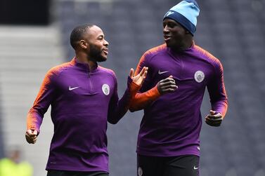 Manchester City forward Raheem Sterling, left, has urged other players to come forward and speak out against racist abuse at football matches. AFP
