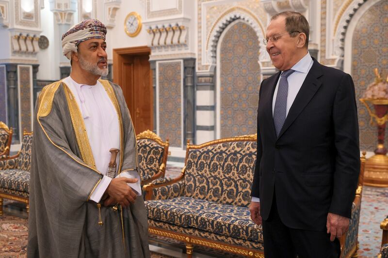 Mr Lavrov and Sultan Haitham talk during their meeting at Al Alam palace.  AP Photo