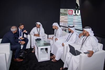 Omar Al Suwaidi, Undersecretary of the Ministry of Industry and Advanced Technology, third left, and other officials during a meeting with Schneider Electric officials. Photo: MoIAT