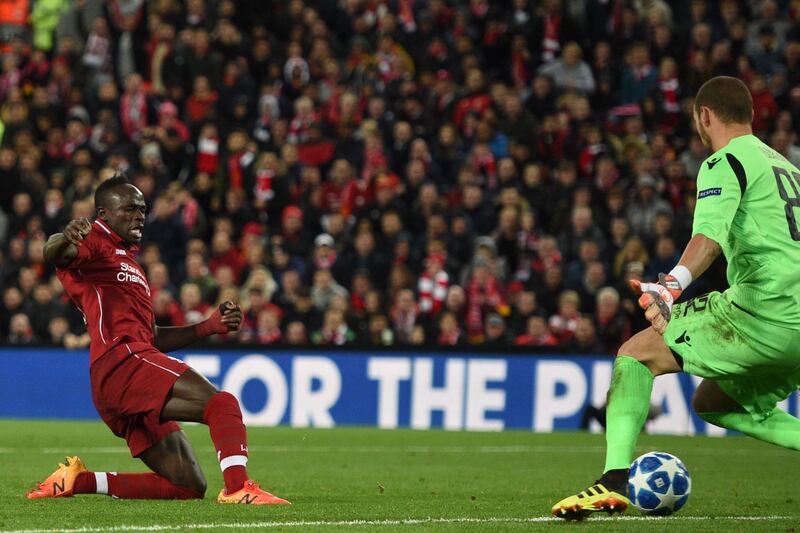 Liverpool's Senegalese striker Sadio Mane shoots past Red Star Belgrade's Canadian goalkeeper Milan Borjan to make it 4-0. AFP