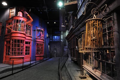TO GO WITH AFP STORY BY NATHALIE AURIOL
A general view shows the stores that line Diagon Alley during a preview of the Warner Bros Harry Potter studio tour "The Making of Harry Potter" in north London on March 26, 2012. "The Making of Harry Potter", which opens on March 31, is the latest spin-off from the best-selling books about the boy wizard, promising a chance to re-live his adventures with a trip through the set of the blockbuster movies. AFP PHOTO/CARL COURT / AFP PHOTO / CARL COURT