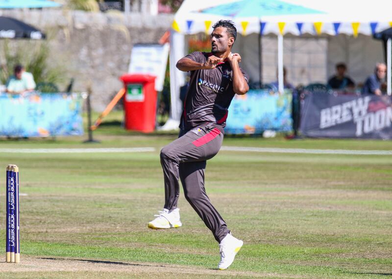 The UAE's Sabir Ali bowls. 