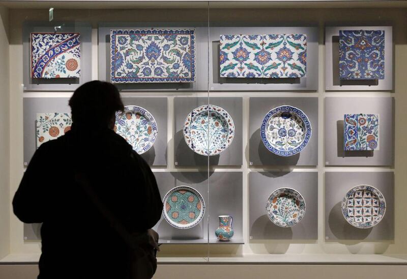 A ceramic Iznik pottery plates and tiles from the Ottoman Empire period displayed at the Louvre Museum in Paris before it is transferred to the Louvre in Abu Dhabi on April 28. Francois Guillot/AFP