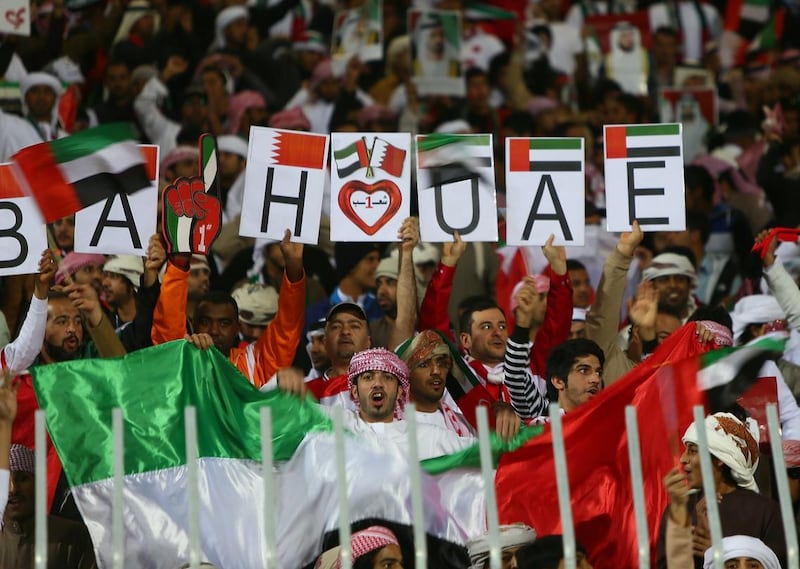 Bahraini and Emirati supporters make themselves heard in the National Stadium ahead of kick-off. AFP