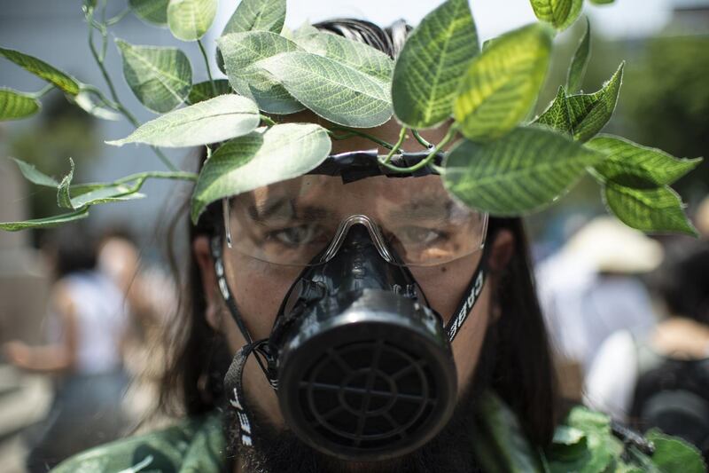 A demonstrator is pictured during the second edition of the 'Global strike for the future' in Mexico City. AFP