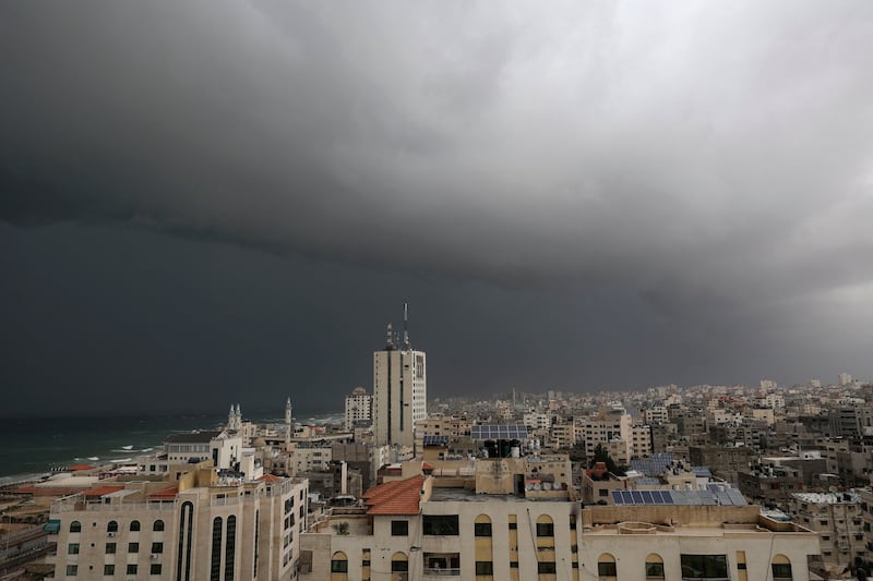 Storm clouds over Gaza City. AFP