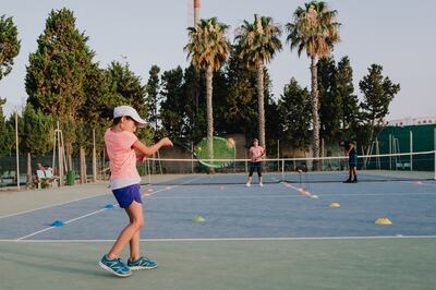 A future tennis star practises her forehand at Monastir Tennis Club, where Ons Jabeur trained as a young player. Erin Clare Brown / The National