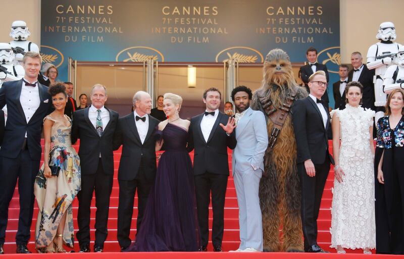 71st Cannes Film Festival - Screening of the film "Solo: A Star Wars Story" out of competition - Red Carpet Arrivals - Cannes, France May 15, 2018. Director Ron Howard, Star Wars' character Chewbacca and cast members Alden Ehrenreich, Donald Glover, Woody Harleson, Emilia Clarke, Joonas Suotamo, Thandie Newton, Phoebe Waller-Bridge, Paul Bettany pose. REUTERS/Regis Duvignau