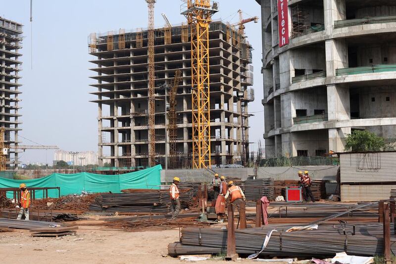 Above, the 80-storey, 300-metre-high tower Spira being built by Arabian Construction Company in India. Pallava Bagla / Corbis