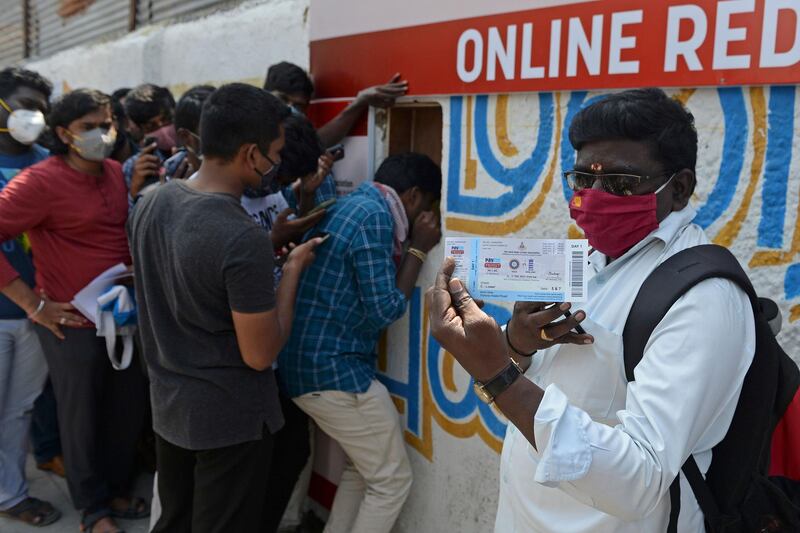 A fan shows his ticket for the second Test between India and England at the M.A. Chidambaram Stadium in Chennai. AFP