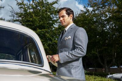 A handout photo of HENRY CAVILL as Solo in Warner Bros. Pictures' action adventure "THE MAN FROM U.N.C.L.E.," a Warner Bros. Pictures release.