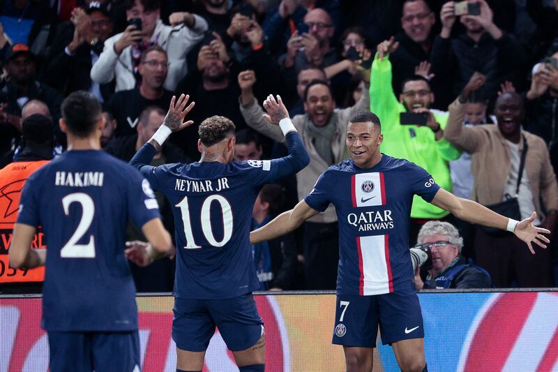 Kylian Mbappe celebrates with teammates after scoring PSG's second goal. AFP