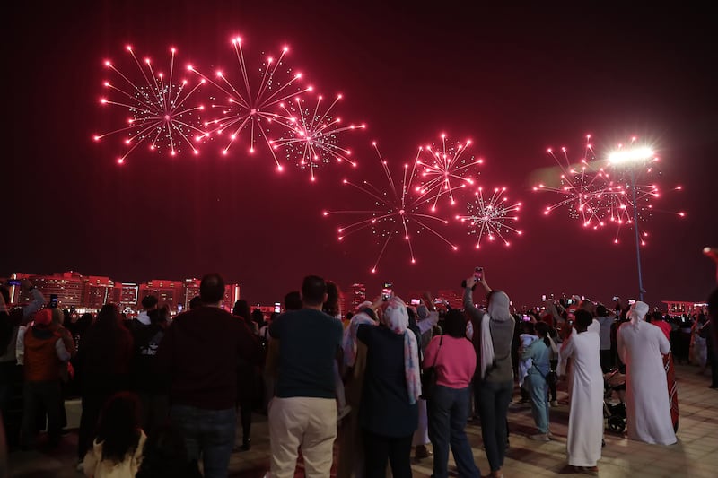 Residents and visitors turned out in large numbers to see the fireworks at Yas Bay. Pawan Singh / The National