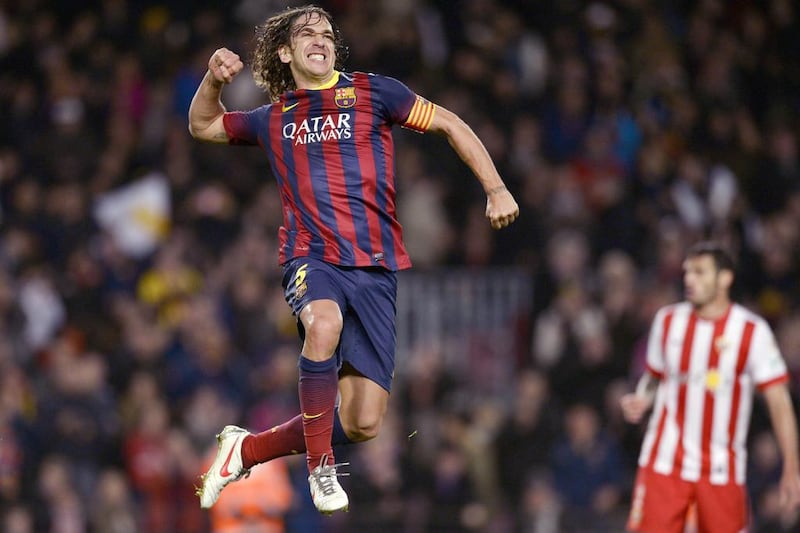 Carles Puyol started with Barcelona and may even retire as a true legend of the club in Spain.  Lluis Gene / AFP