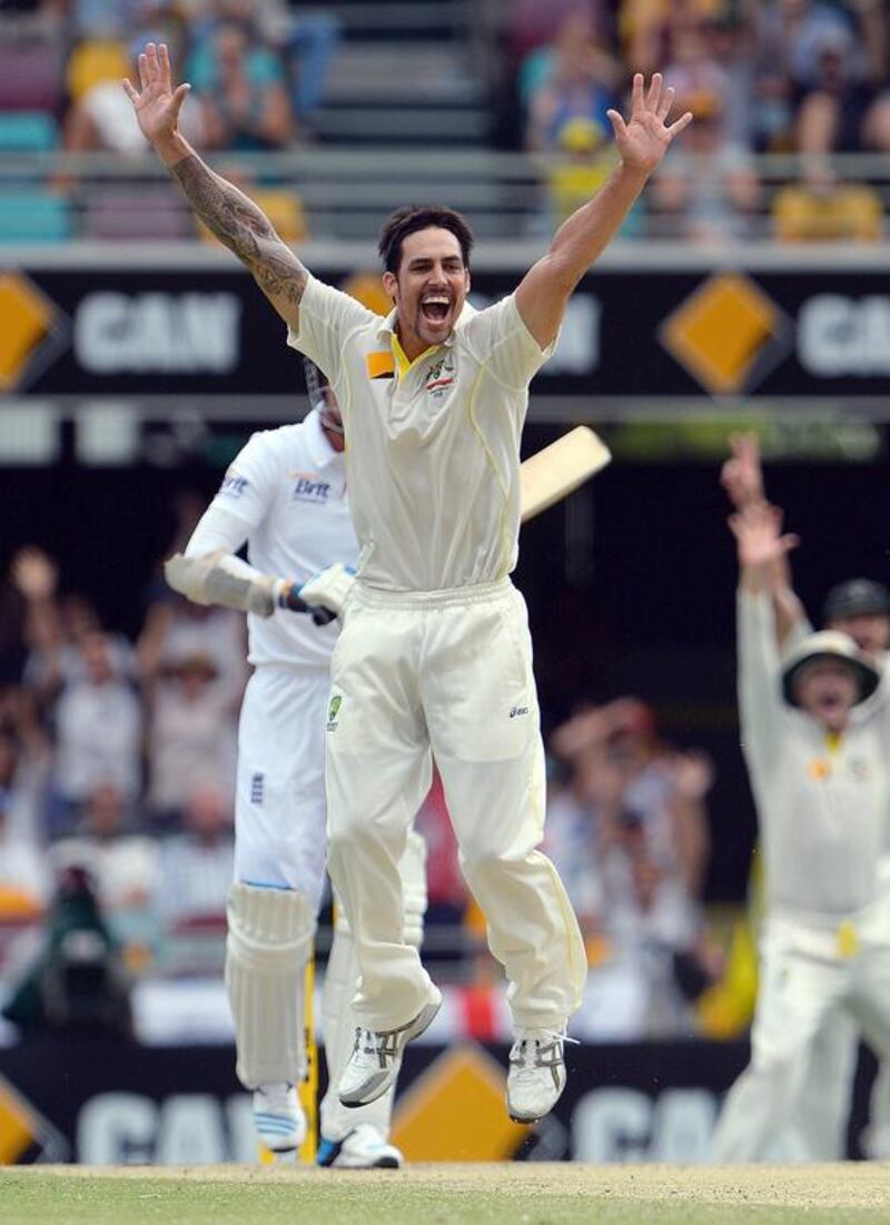 Mitchell Johnson led Australia's bowlers and cheering section in Australia's win in the First Test at the Gabba Cricket Ground in Brisbane on November 24. Saeed Khan / AFP

