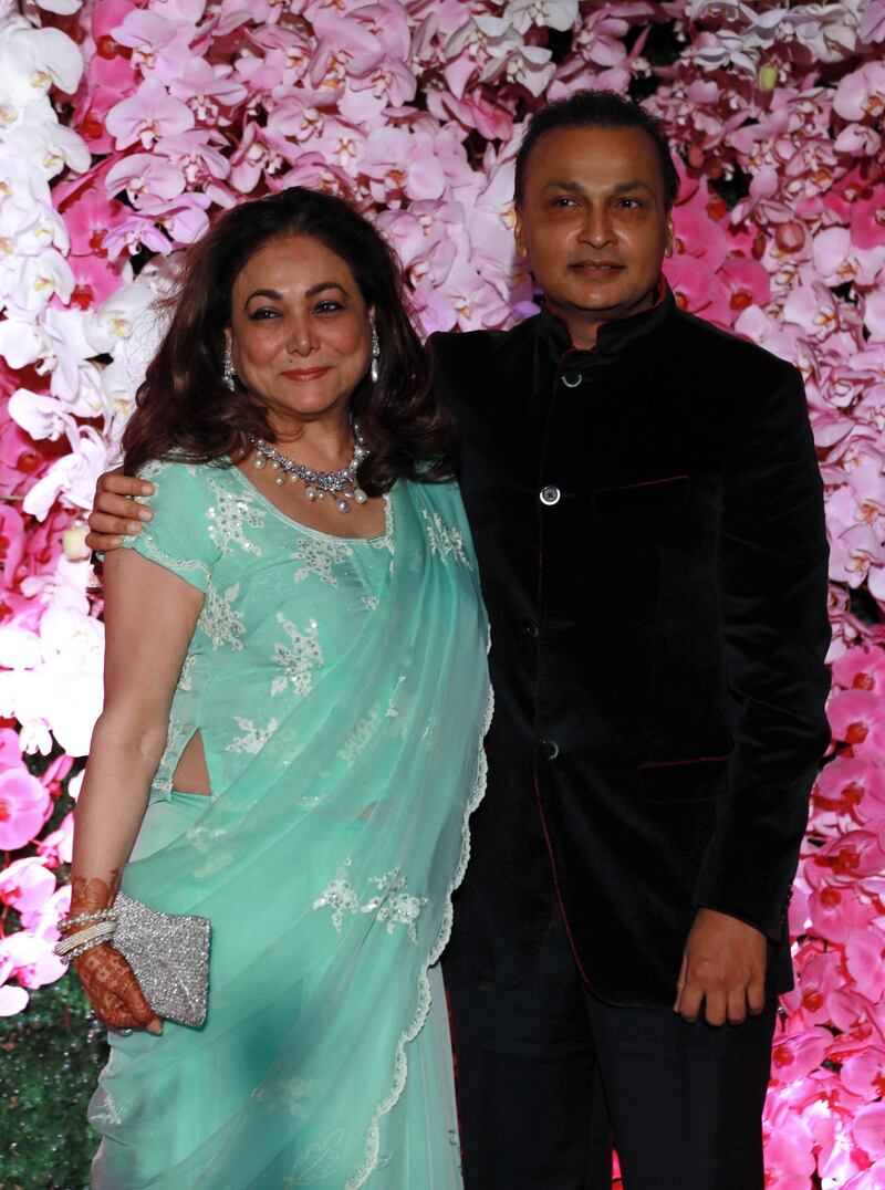 Anil Ambani (R), chairman of Reliance Group and his wife Tina Ambani. Photo: EPA