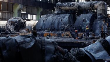 Engineers at a Ukrainian thermal power plant heavily damaged by recent Russian missile strikes. Reuters