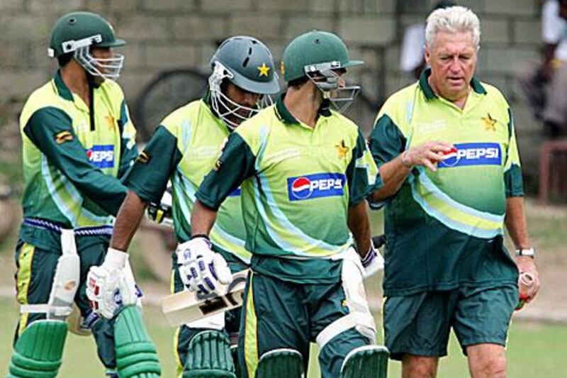 While at the helm of the Pakistan team, Bob Woolmer, right, had set a new standard for other coaches in the country, thereby helping bring more professionalism.