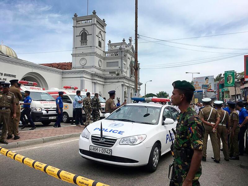 Sri Lankan Army soldiers secure the area around a church after a blast in Colombo, Sri Lanka.  AP