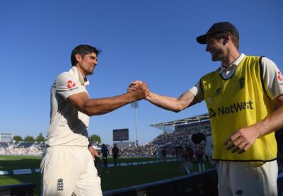 SOUTHAMPTON, ENGLAND - SEPTEMBER 02: England player Alastair Cook is congratulated by Chris Woakes (r) after the 4th Specsavers Test Match between England and India at The Ageas Bowl on September 2, 2018 in Southampton, England.  (Photo by Stu Forster/Getty Images)