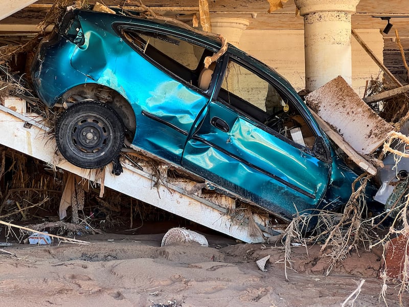 A damaged car in Derna, Libya, after a powerful storm and heavy rain hit the country. Reuters