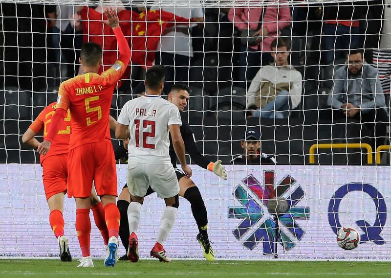 Philippines' goalkeeper Michael Falkesgaard, center background, looks to the ball enter on his goal which scored by China's defender Yu Dabao, during the AFC Asian Cup group C soccer match between China and Phillipines at Mohammed Bin Zayed Stadium in Abu Dhabi, United Arab Emirates, Friday, Jan. 11, 2019. (AP Photo/Kamran Jebreili)