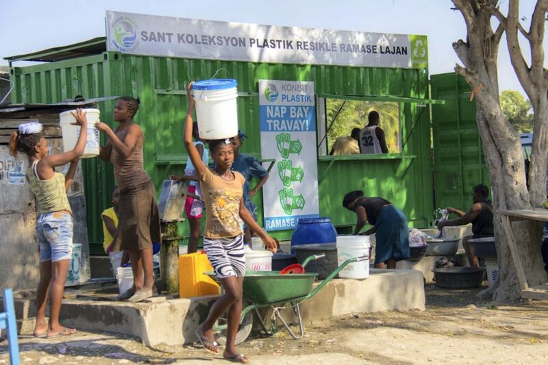 Plastic bags are collected by workers in Haiti before being distributed to companies for use in manufacturing. The funds generated help keep the worker’s children in school. Expo 2020