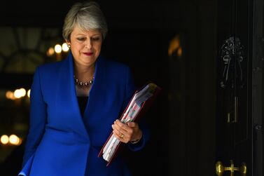 Prime Minister Theresa May leaves 10 Downing Street for her final PMQ's on July 24, 2019 in London, England. Getty Images