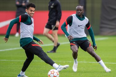 Liverpool's Luis Diaz (L) and Sadio Mane (R) attend a training session at Axa Training Centre in Liverpool, Britain, 25 May 2022.  Liverpool F. C.  will face Real Madrid in the UEFA Champions League final to be held in Paris on 28 May 2022.   EPA/PETER POWELL . 