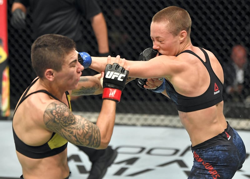 ABU DHABI, UNITED ARAB EMIRATES - JULY 12: (R-L) Rose Namajunas and Jessica Andrade of Brazil trade punches in their strawweight fight during the UFC 251 event at Flash Forum on UFC Fight Island on July 12, 2020 on Yas Island, Abu Dhabi, United Arab Emirates. (Photo by Jeff Bottari/Zuffa LLC)
