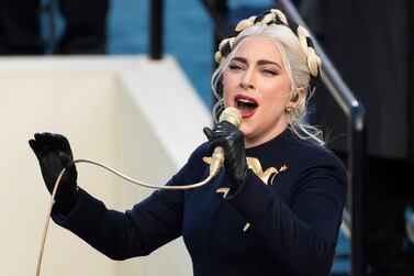 FILE - Lady Gaga sings the national anthem during President-elect Joe Biden's inauguration at the U. S.  Capitol in Washington on Jan.  20, 2021.  James Howard Jackson, a suspect mistakenly released from a Los Angeles County jail where he was being held on suspicion of shooting Lady Gaga’s dog walker and stealing her French bulldogs, has been recaptured, authorities said Wednesday, Aug.  3, 2022.  (Saul Loeb / Pool Photo via AP, File)