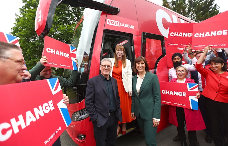 Labour launch their election campaign bus, with Mr Starmer, his deputy Angela Rayner and Rachel Reeves, shadow chancellor, in Uxbridge. Getty Images
