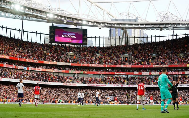 epa07810986 A video assistant referee (VAR) goal decision is announced on a huge screen during the English Premier League soccer match between Arsenal FC and Tottenham Hotspur at the Emirates stadium in London, Britain, 01 September 2019.  EPA/WILL OLIVER EDITORIAL USE ONLY. No use with unauthorized audio, video, data, fixture lists, club/league logos or 'live' services. Online in-match use limited to 120 images, no video emulation. No use in betting, games or single club/league/player publications