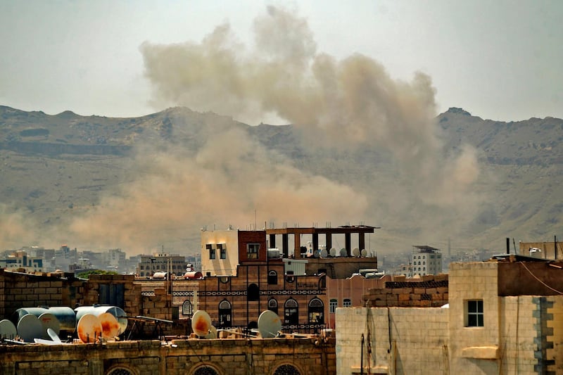Smoke billows following a reported airstrike near the Yemeni capital Sanaa on July 1, 2020. AFP